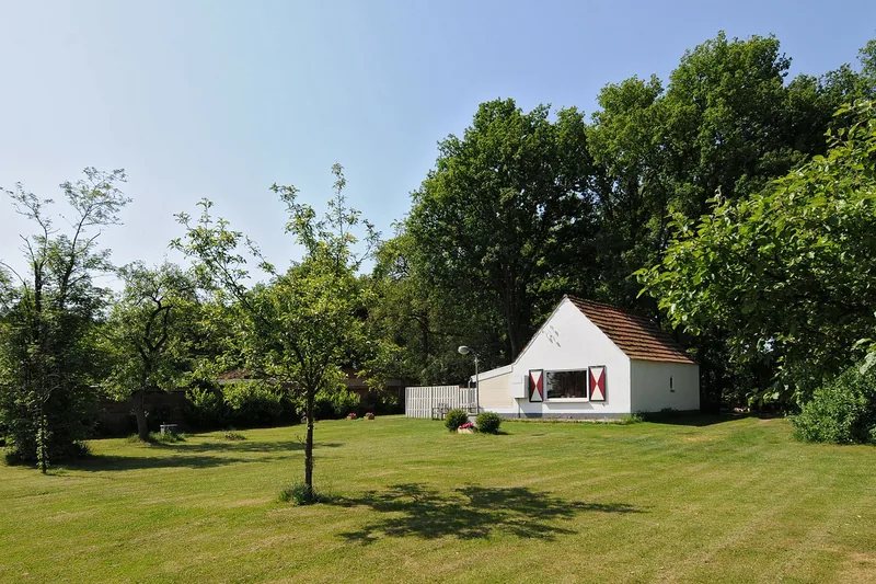 De bestaande woning (wordt herbouwd)